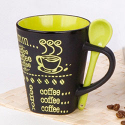 Ceramic coffee mug with spoon